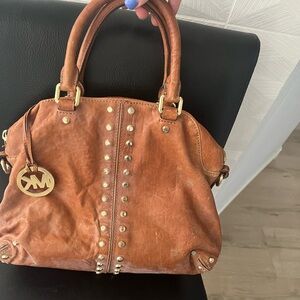 Tan Michael Kors purse with gold studs